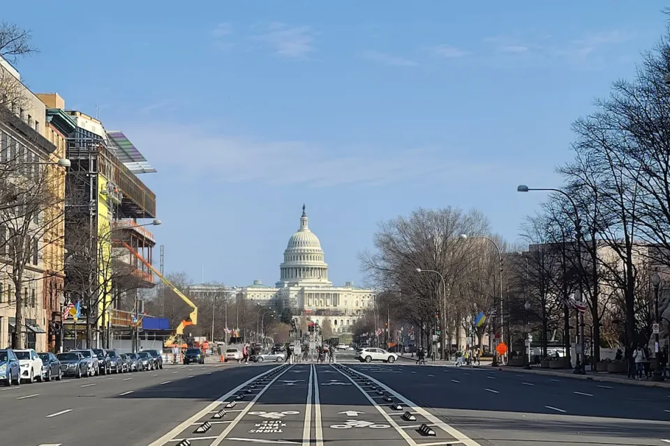 The Capitol dome in Washington, D.C. viewed from middle of Pennsylvania Avenue protected bike lanes.